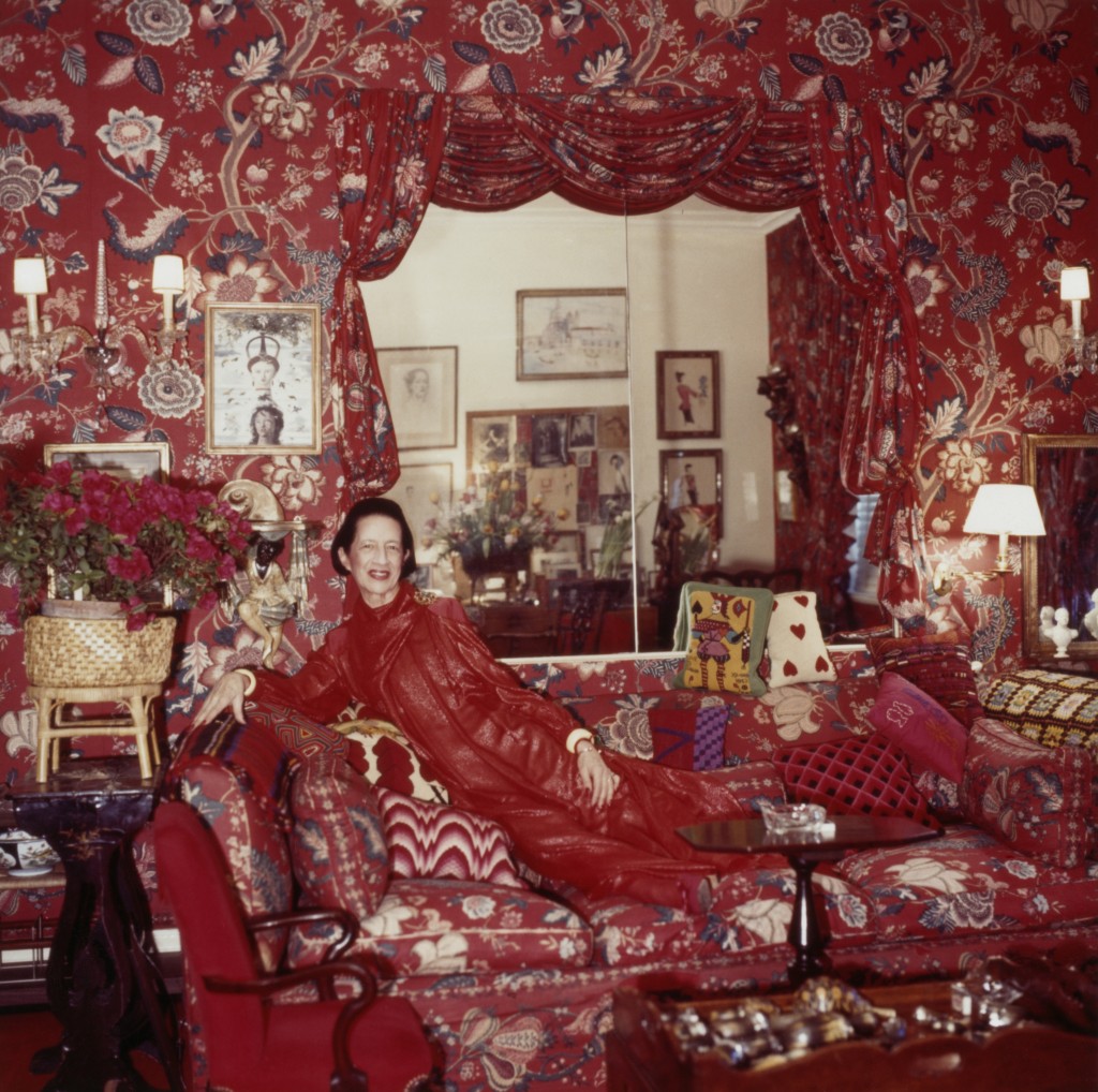 Diana Vreeland surrounded by red furnishings- series, 1979