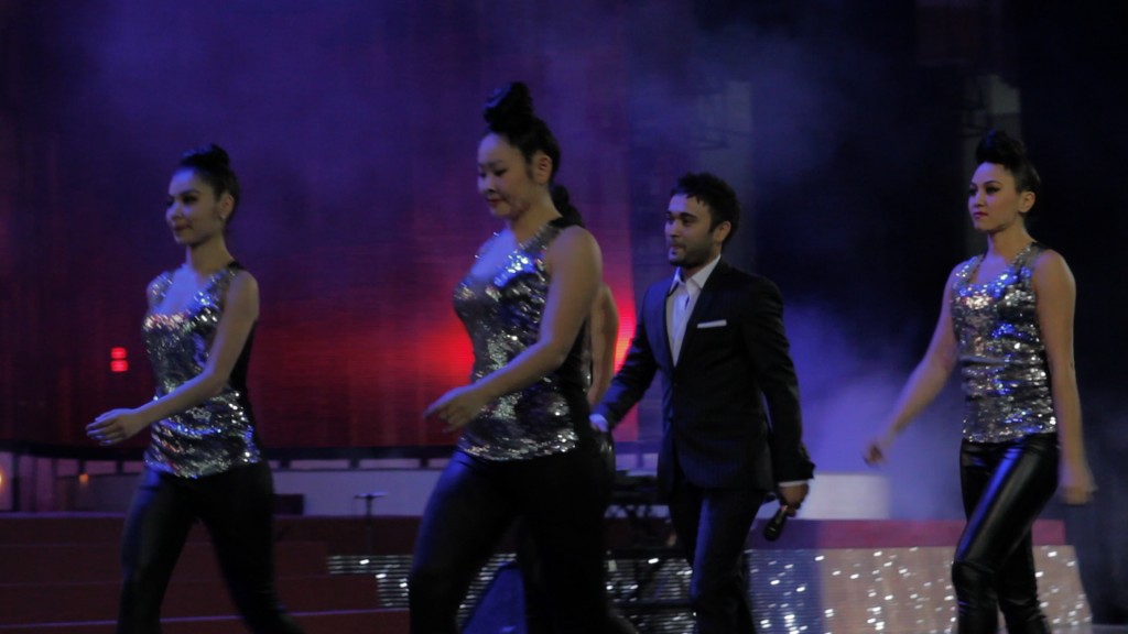 Singer, Shokhruhhonperforming  with back back-up dancers at the M&TVA Awards