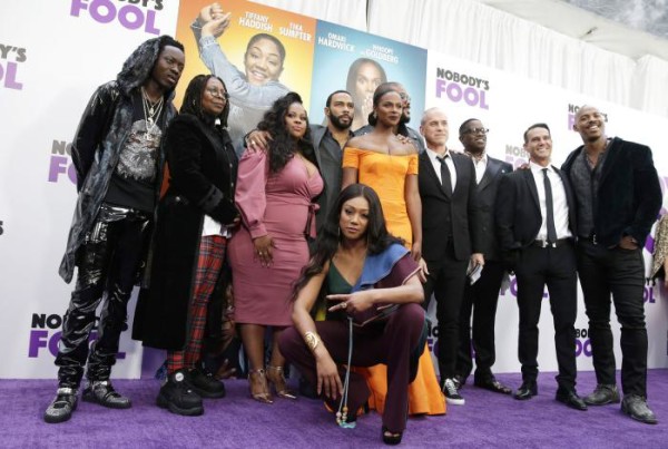 From left to right, Michael Blackson, Whoopi Goldberg, Amber Riley, Omari Hardwick, Tiffany Haddish (front), Tika Sumpter, Tyler Perry, Brian Robbins, Mark E. Swinton, Will Areu, and Mehcad Brooks arrive on the purple carpet. Photo by John Angelillo/UPI | License Photo