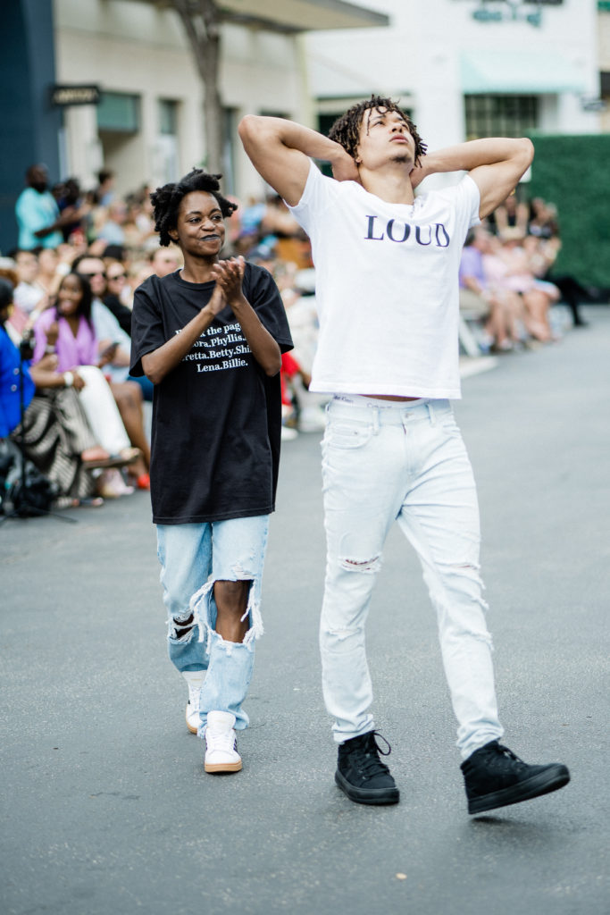 LoudPen, Designer of Pennies & Pens and Marcus Bradshaw in Pennies & Pens Spring/Summer 2022 at Austin Fashion Week Final Walk. Image by Todd White